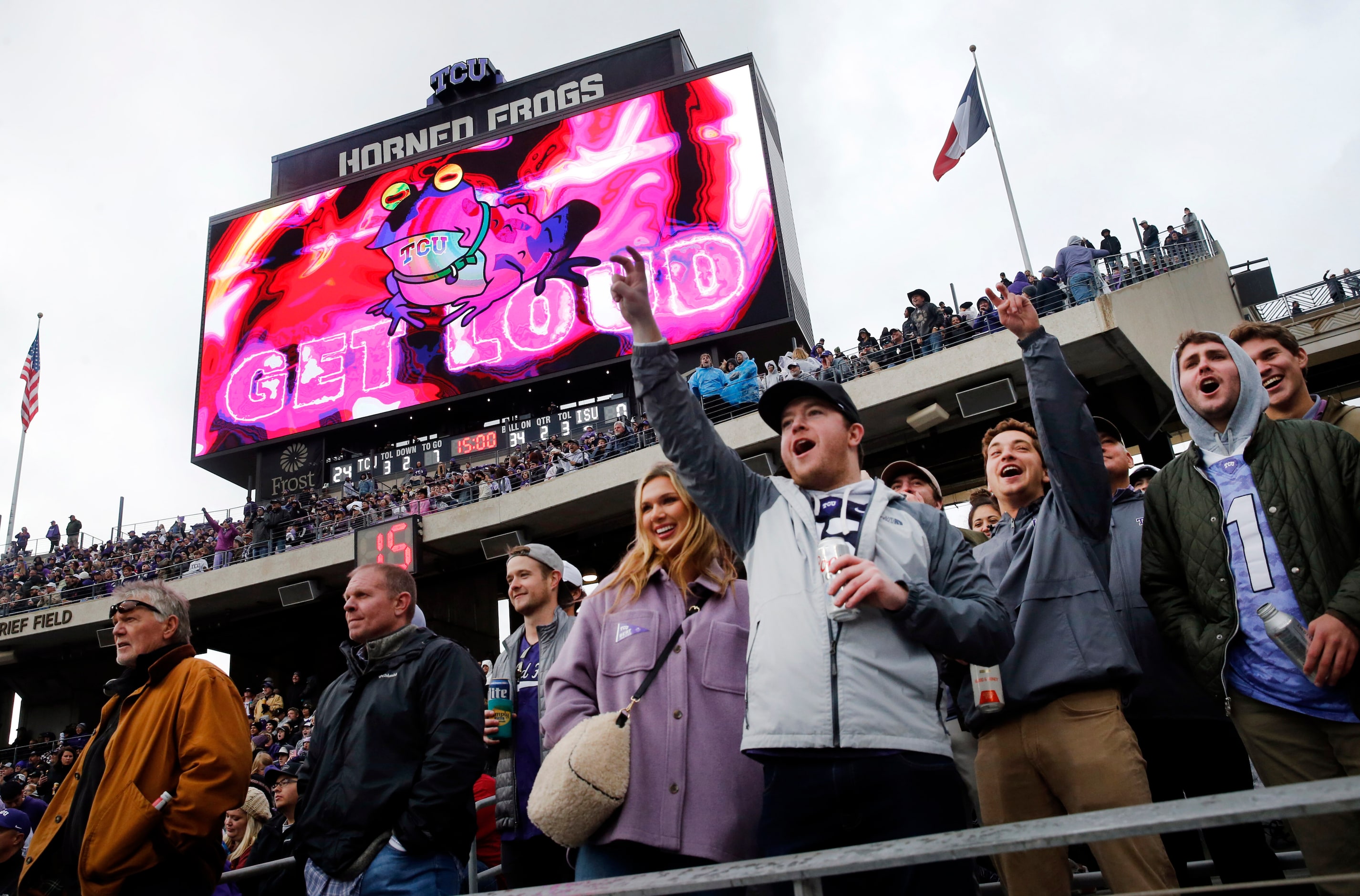 TCU Horned Frogs fans cheer as the Hypnotoad appears on the video board during the second...