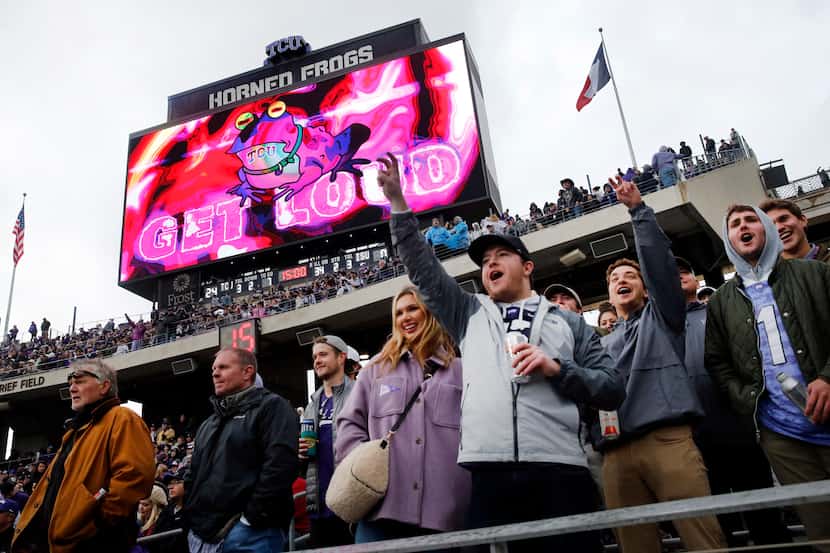 TCU Horned Frogs fans cheer as the Hypnotoad appears on the video board during the second...