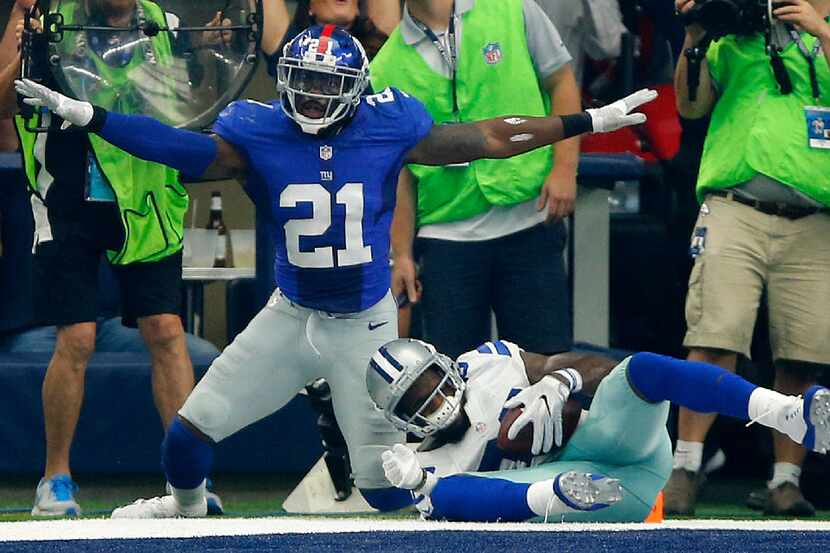 New York Giants free safety Landon Collins (21) signals no-catch on Dallas Cowboys wide...