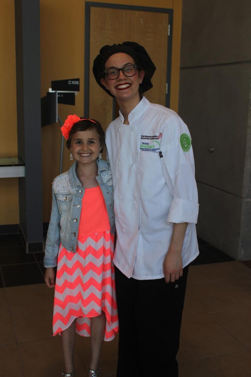 
Madison Callaghan (right) with 10-year-old Julia Brown at the benefit dinner for which...