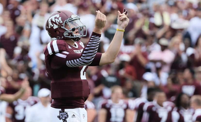 COLLEGE STATION, TX - AUGUST 31:  Johnny Manziel #2 of the Texas A&M Aggies celebrates a...