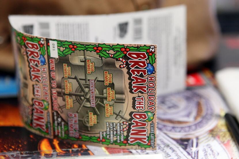 In this 2012 file photo, Texas Lottery scratch tickets are pictured at Cigarette Gallery in...