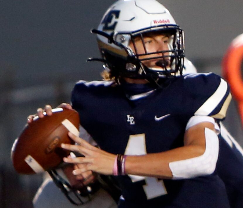 Little Elm quarterback John Mateer (4) looks to make a pass downfield during first quarter...