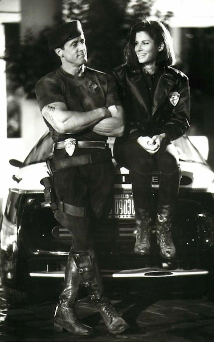 Sylvester Stallone and Sandra Bullock in "Demolition Man"