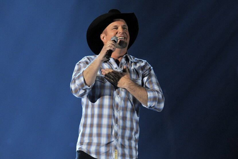 This April 7, 2013 file photo shows Garth Brooks performing at the 48th Annual Academy of...