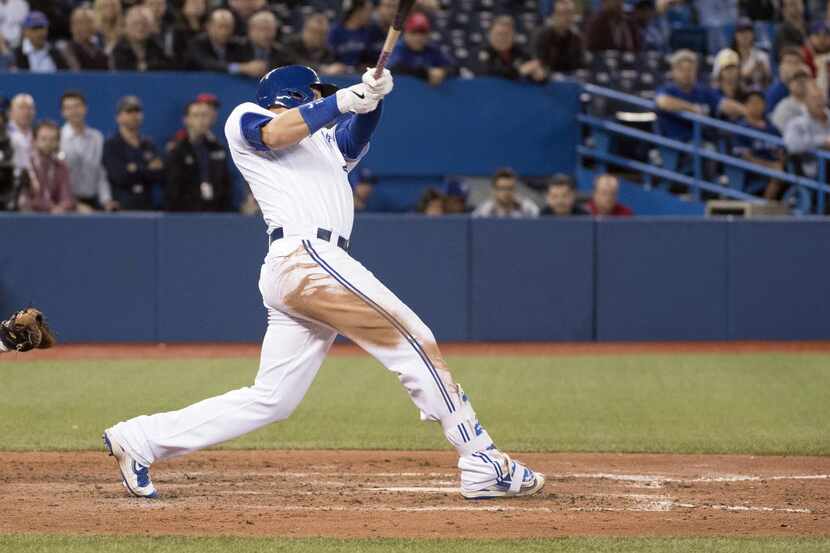 May 3, 2016; Toronto, Ontario, CAN; Toronto Blue Jays first baseman Justin Smoak (14) hits a...