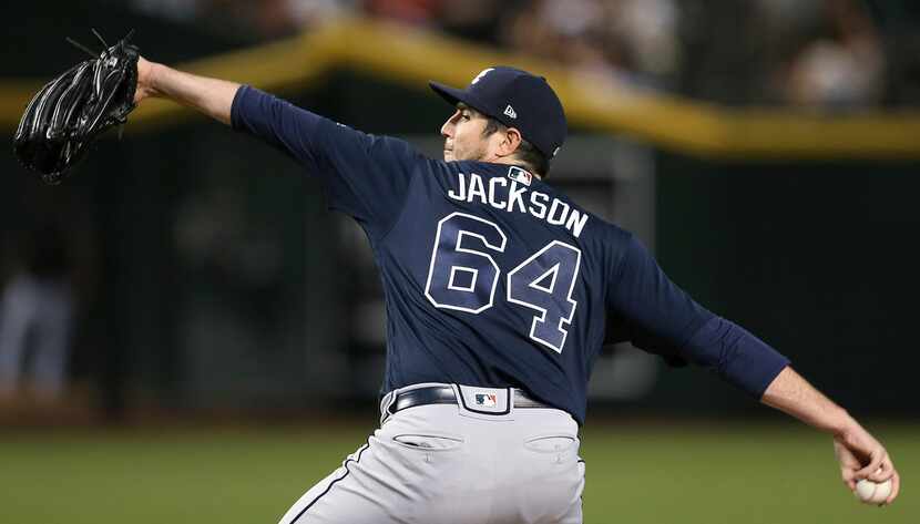 Atlanta Braves relief pitcher Luke Jackson throws against the Arizona Diamondbacks during...