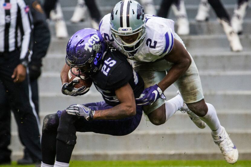 TCU Horned Frogs wide receiver KaVontae Turpin (25) is tackled by Kansas State Wildcats...