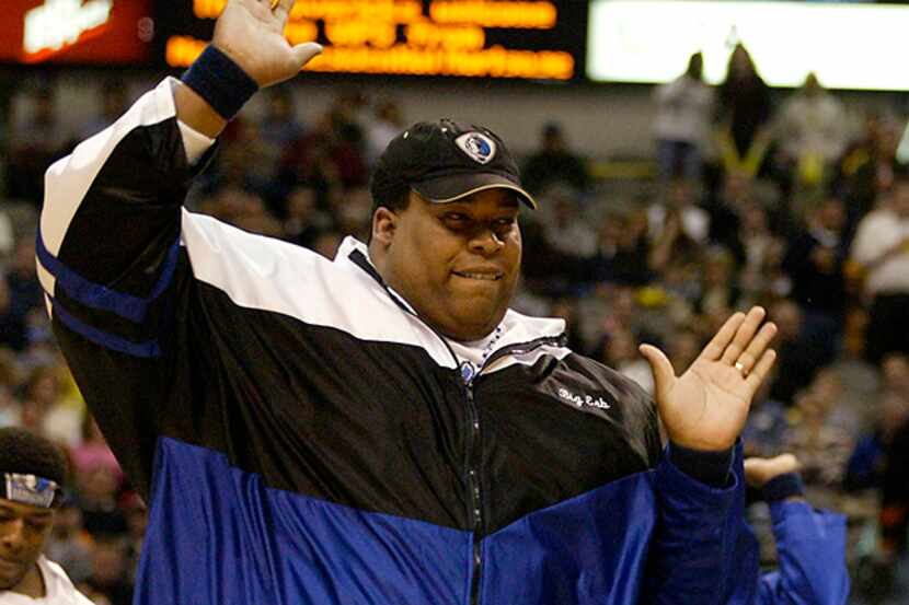 Erbie Lee Bowser performs with the Dallas Mavericks ManiAACs during a game in February 2004...