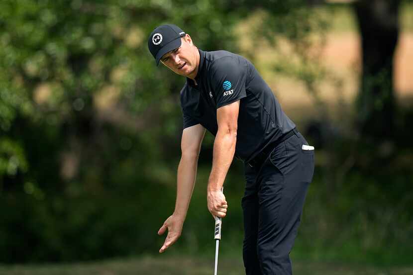 Jordan Spieth reacts to his putt on the 13th hole during the third round of the Texas Open...