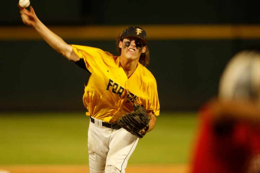 Forney pitcher Mason Englert (8) delivers a strike out pitch to end the 4th inning of play...