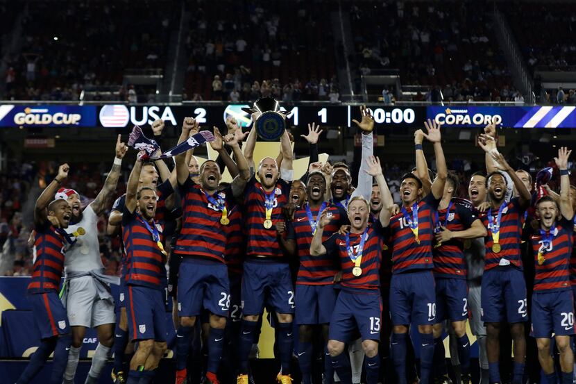 Michael Bradleyof USA lifts the Trophy of the CONCACAF Gold Cup after defeating Jamaica at...