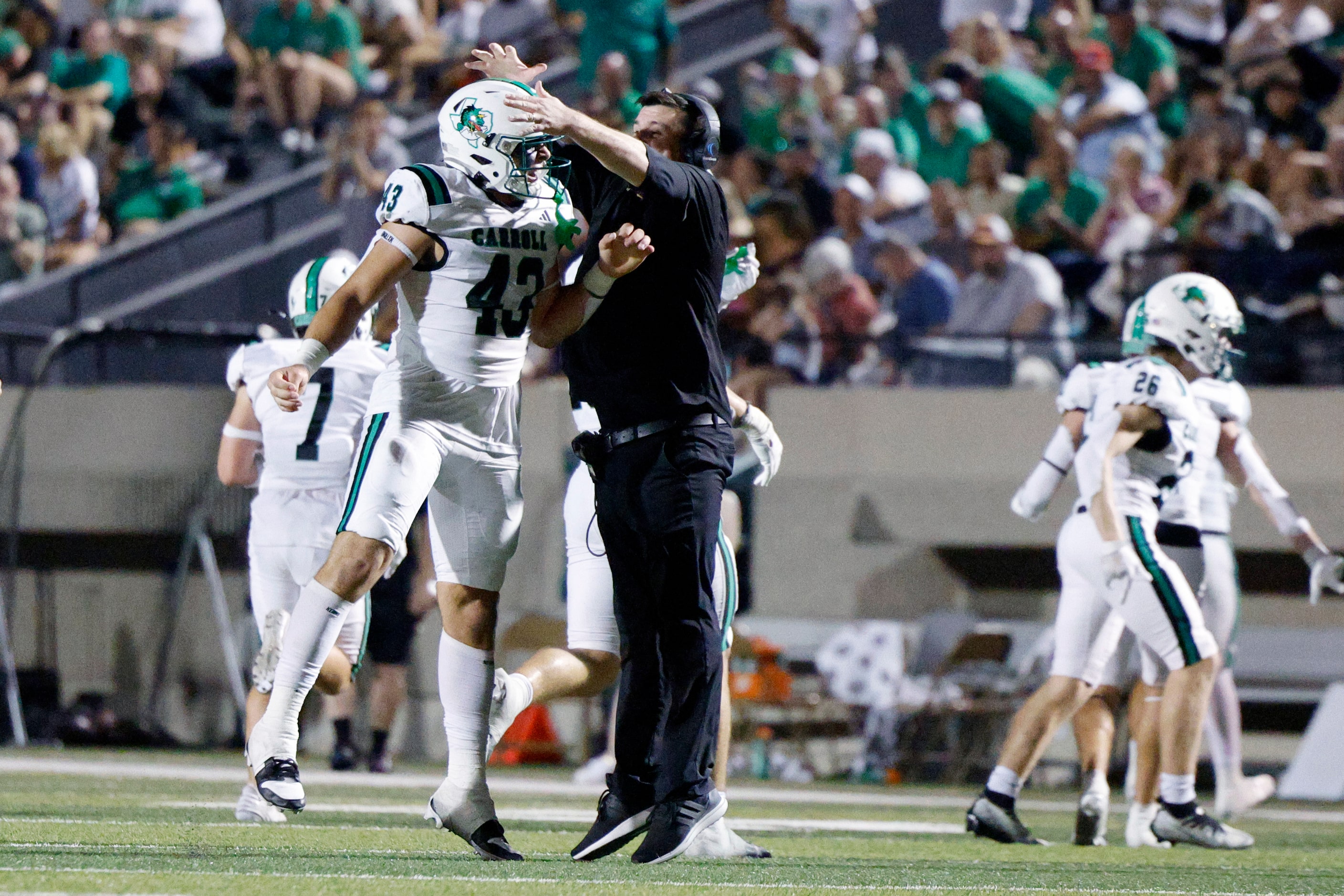 Southlake Carroll defensive lineman Crawford Taylor (43) celebrates after recovering a...