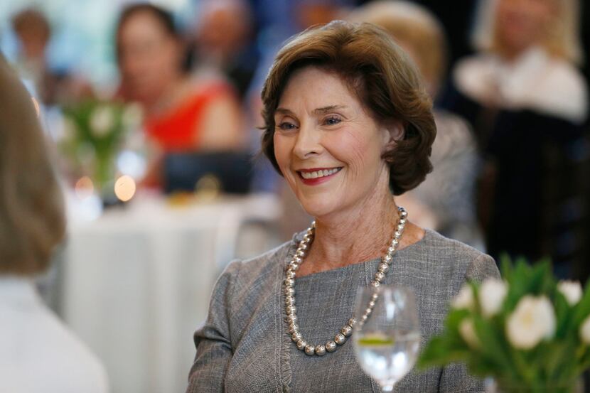 Laura Bush is introduced before a reception honoring philanthropist Ruth Altshuler at Perot...