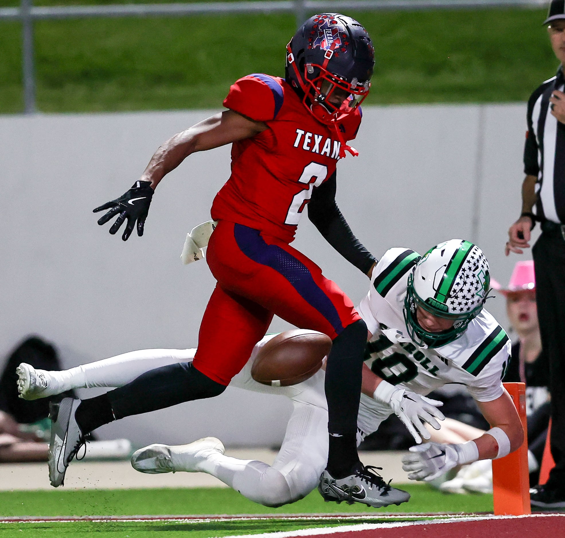 Southlake Carroll wide receiver Brody Knowles (10) tries to come up with a reception against...