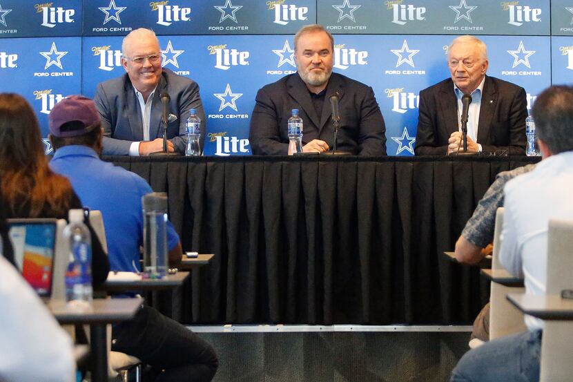 Stephen Jones (left), Mike McCarthy, and Jerry Jones address the media as the Dallas Cowboys...
