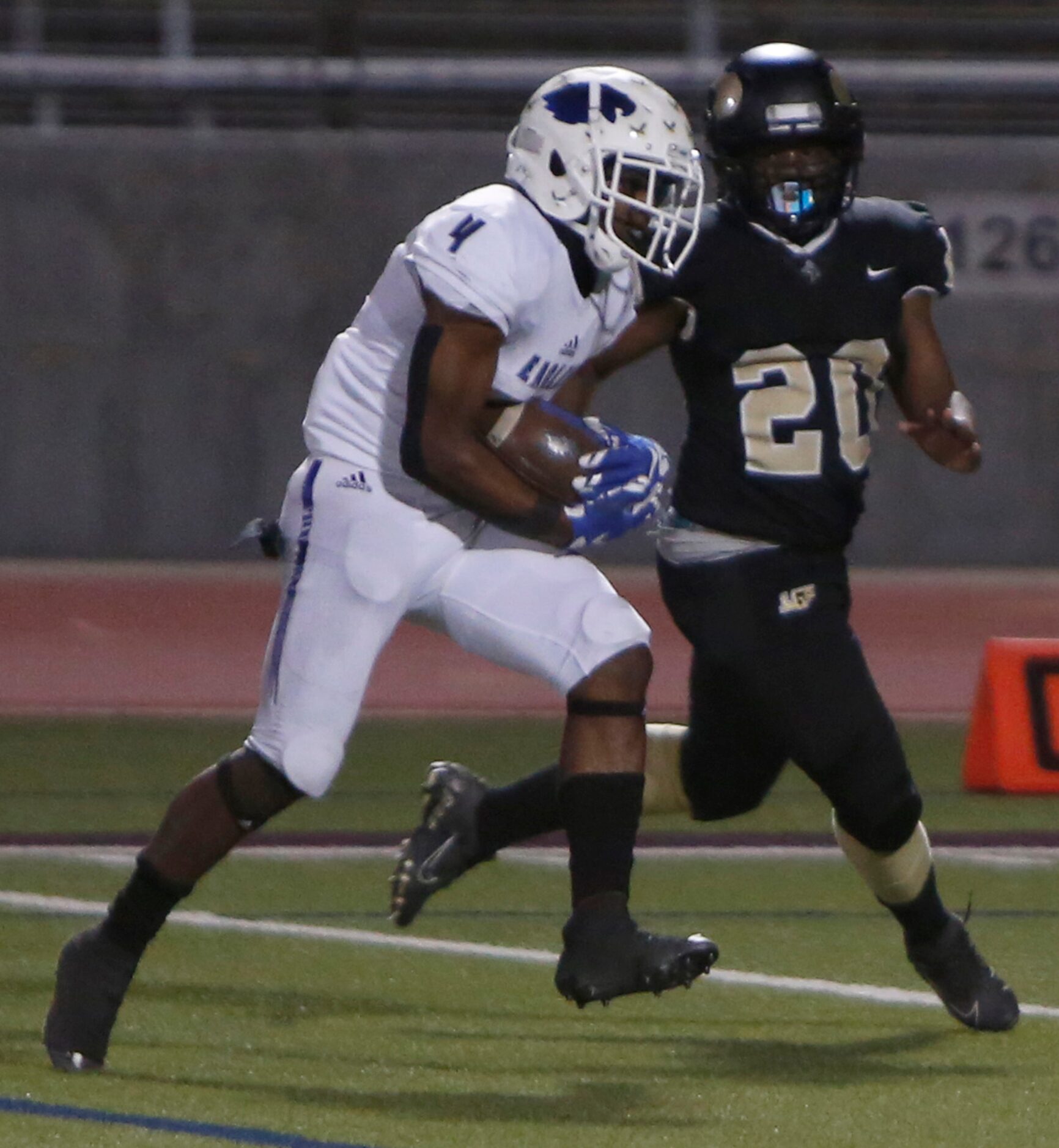 Wilmer Hutchins receiver Danajae Punch (4) pulls in a reception and carries it into the end...