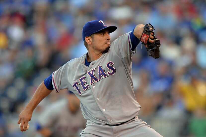 Sep 21, 2013; Kansas City, MO, USA; Texas Rangers pitcher Matt Garza (22) delivers a pitch...