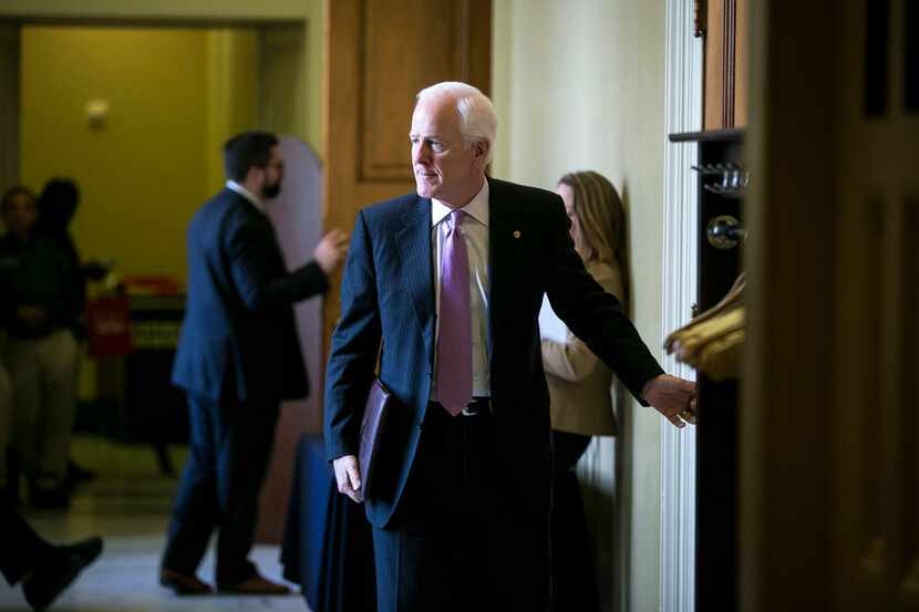 Sen. John Cornyn (R-Texas) departs a lunch with Senate Republicans on Capitol Hill in...