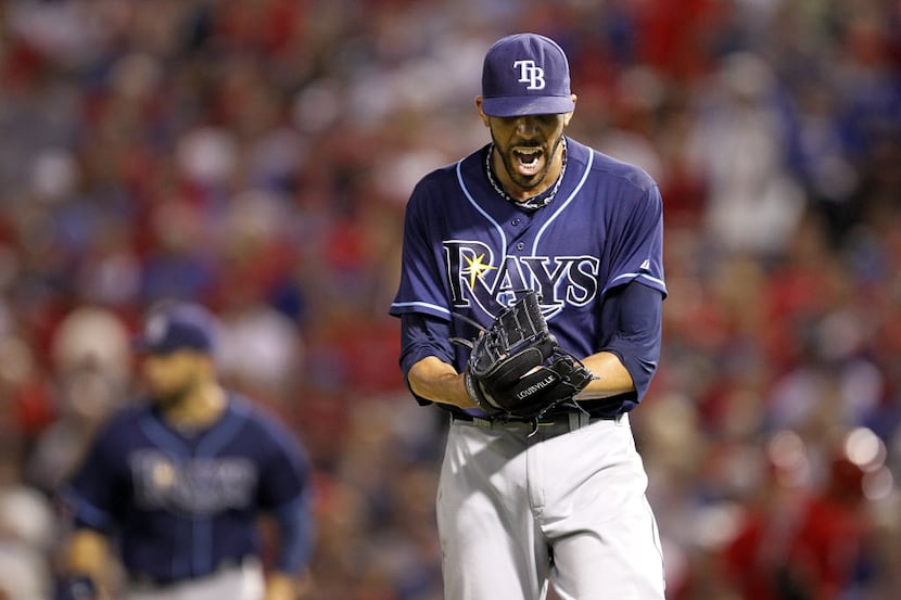 Tampa Bay Rays starting pitcher David Price (14) reacts after his infield got the third out...