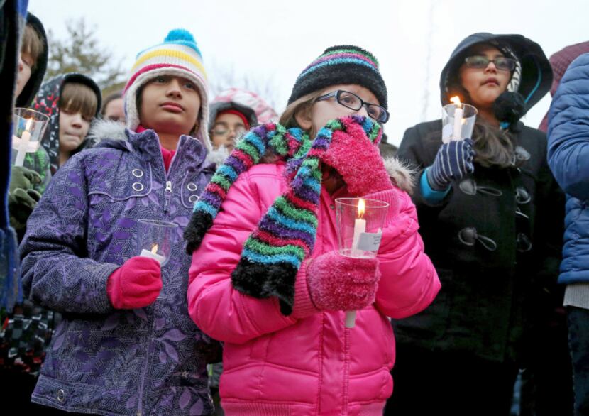 One of  Arnav Dhawan's classmates, Chloe Town, 10, (middle), attended Wednesday's...