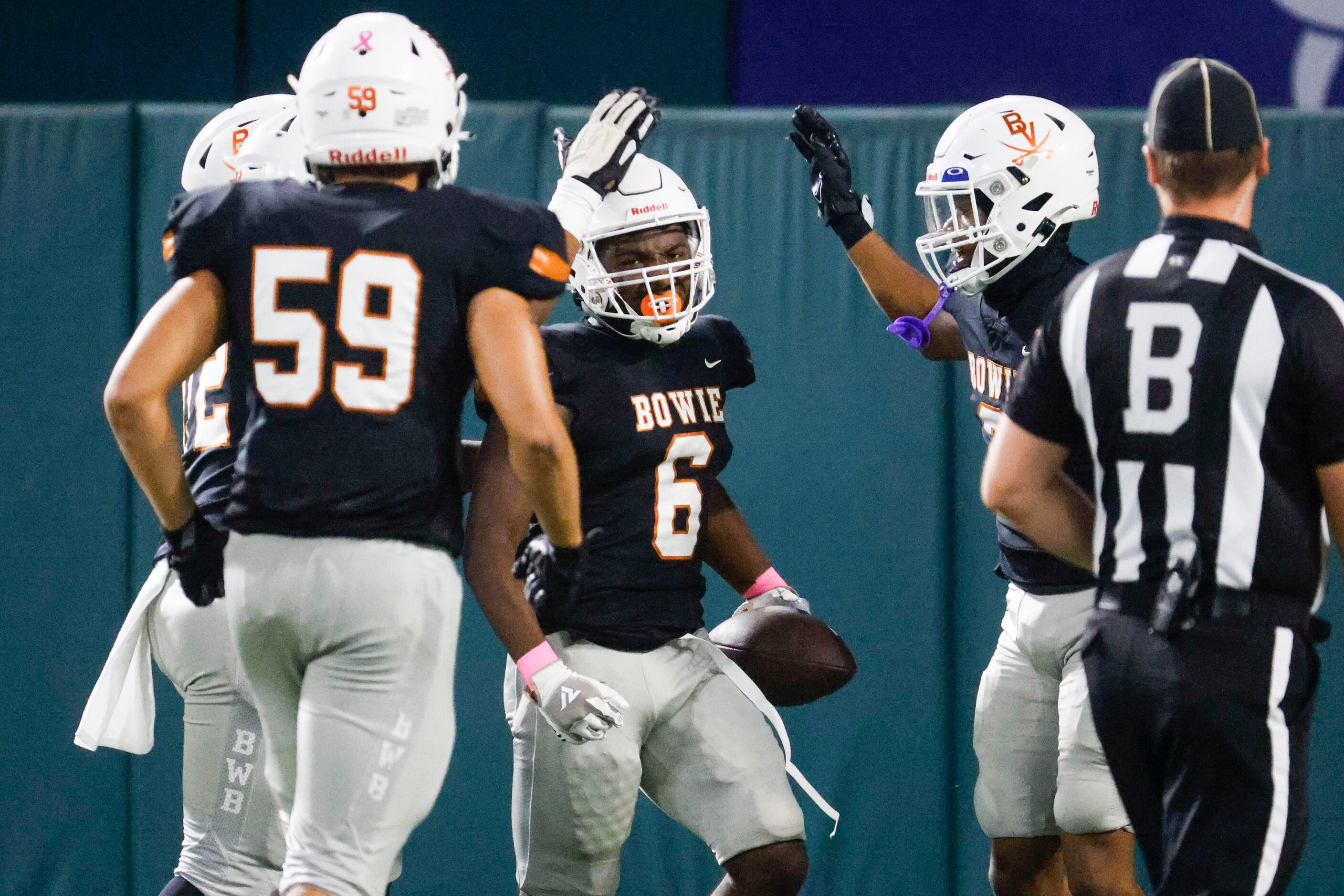 James Bowie High’s Darrion Bowers (6) celebrates a touchdown during the first half of a...