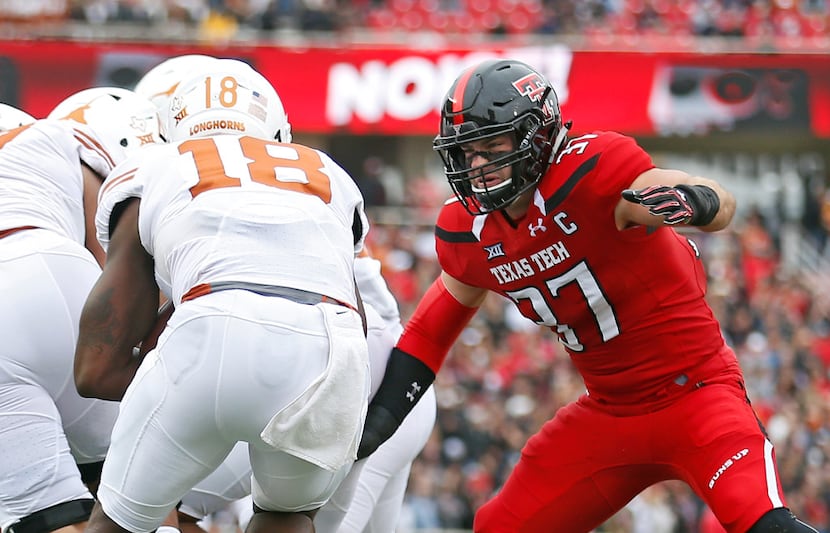 Texas Tech's Luke Stice (37) looks to tackle Texas' Tyrone Swoopes (18) during an NCAA...