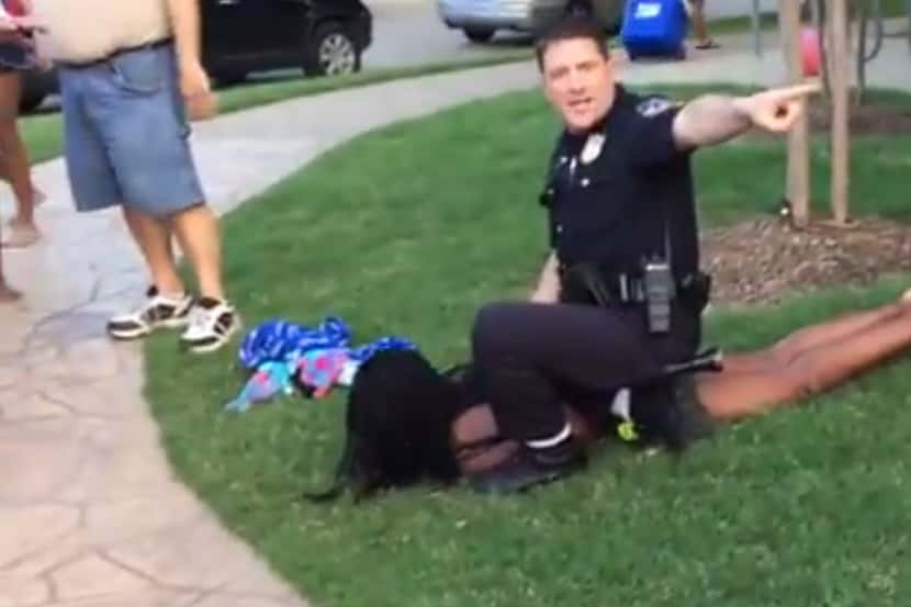 McKinney police Cpl. Eric Casebolt warned others away as he handcuffed a teenage girl...