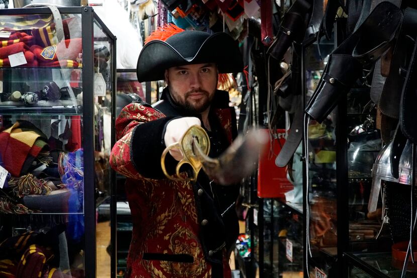 Matt Hashem models his new pirate costume at Dallas Vintage Shop in Plano.