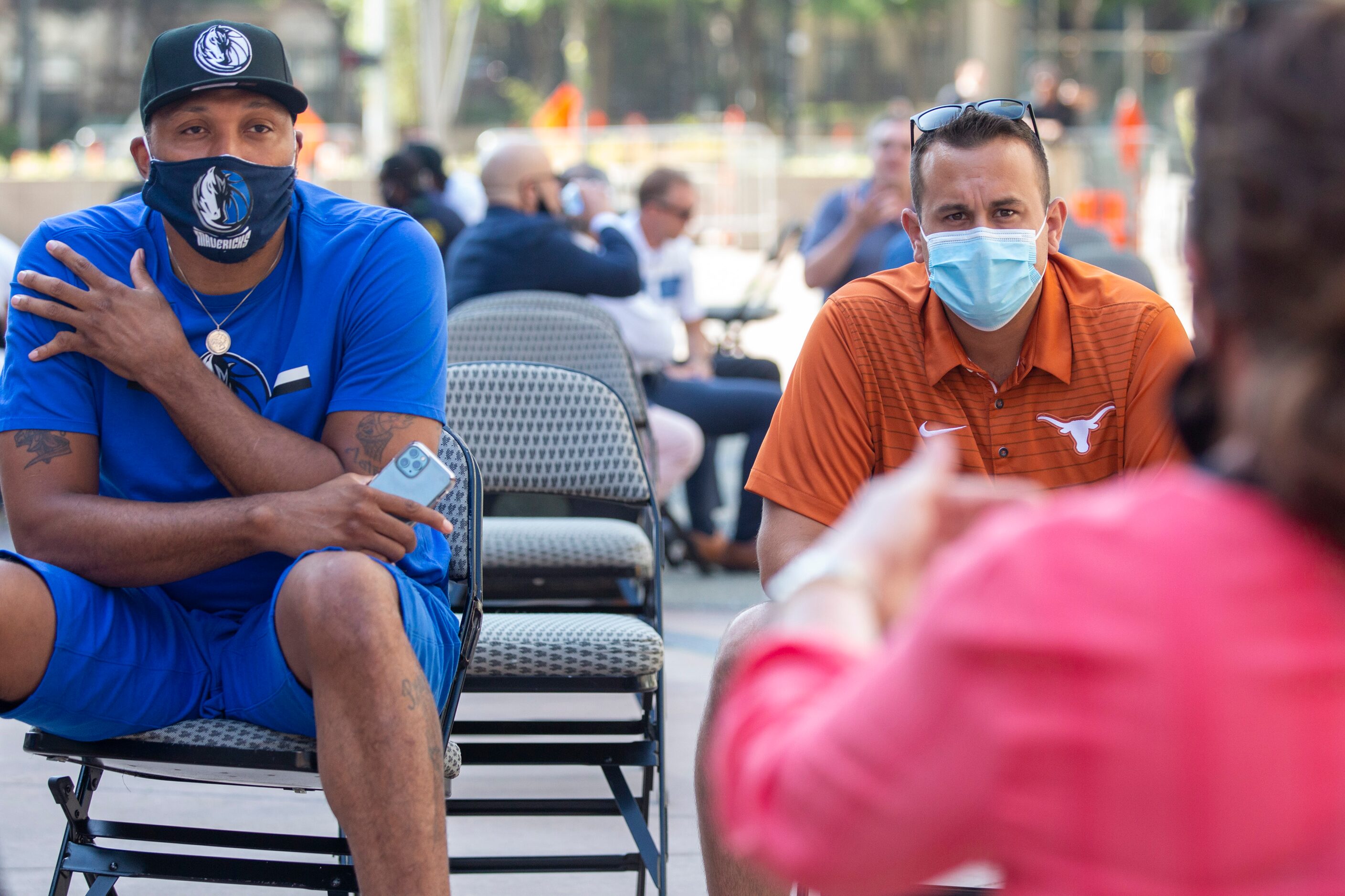 Former Dallas Mavericks player Shawn Marion (left) and council member Adam Bazaldua list to...