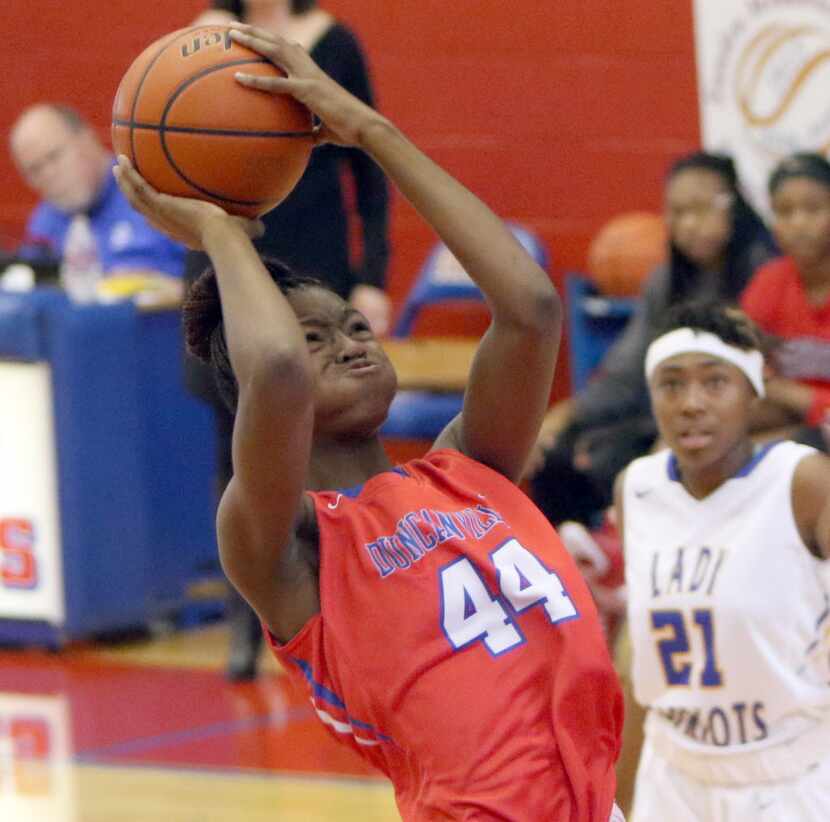 Duncanville post Jayla Johnson (44) puts up a shot during second half action against Garland...