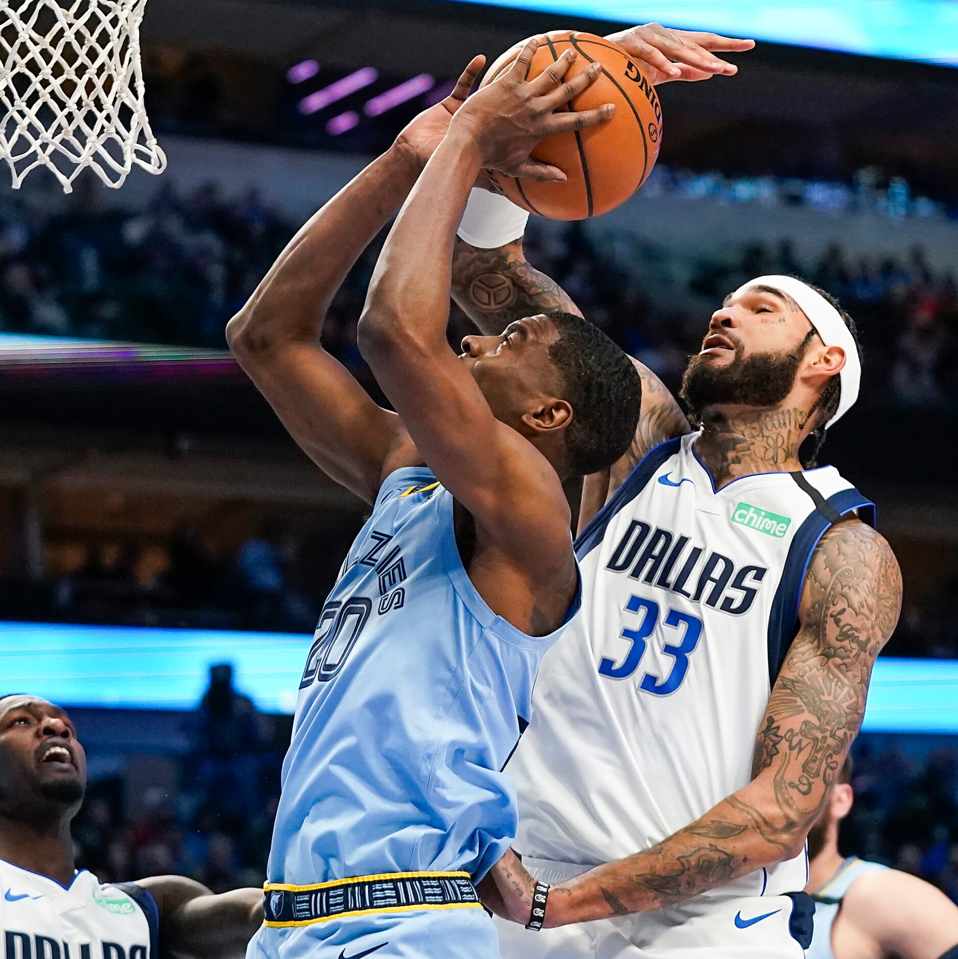 Dallas Mavericks center Willie Cauley-Stein (33) blocks a shot by Memphis Grizzlies guard...