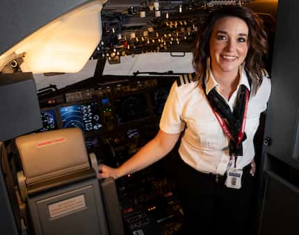 First Officer Jennifer McIntyre of Southwest Airlines poses for a photo in the cockpit of a...