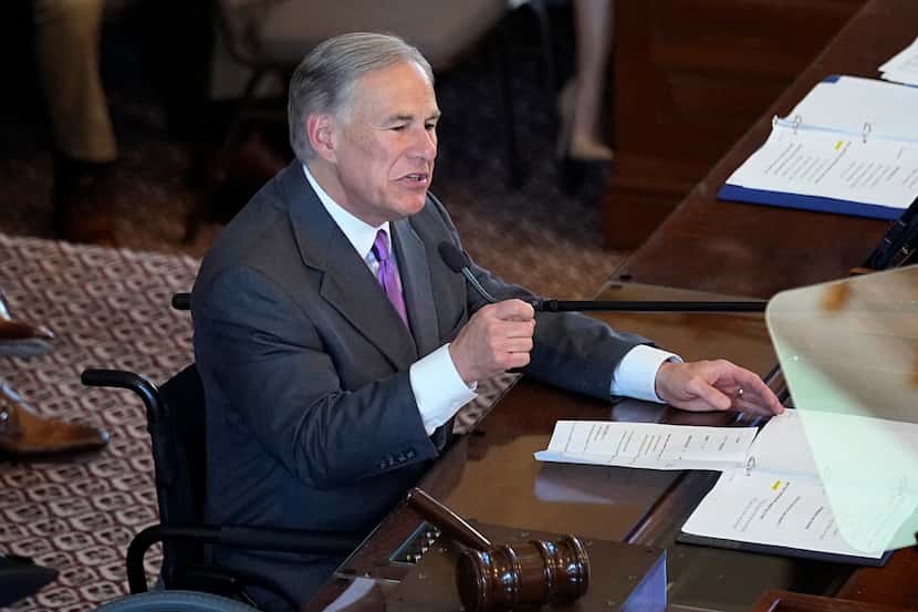 Texas Gov. Greg Abbott addresses the Texas House at the Capitol during the first day of the...