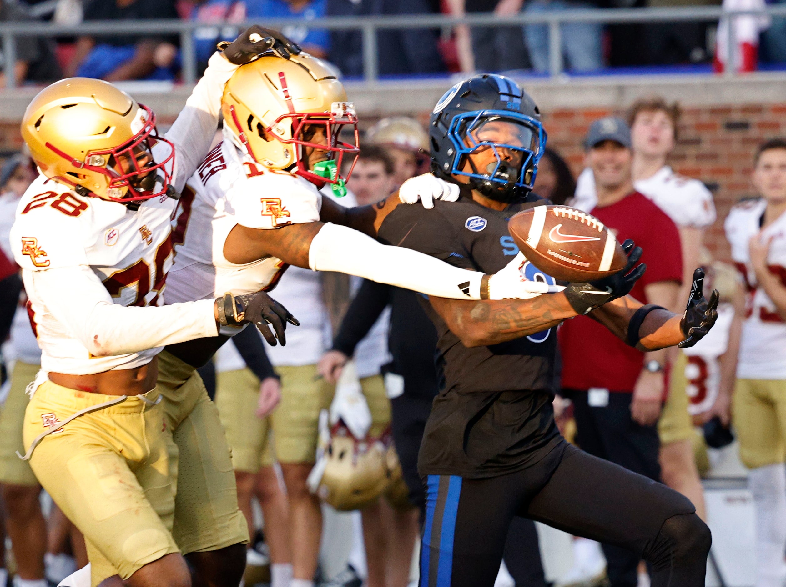 SMU wide receiver Key'Shawn Smith (9) fails to make the catch against *Boston College...