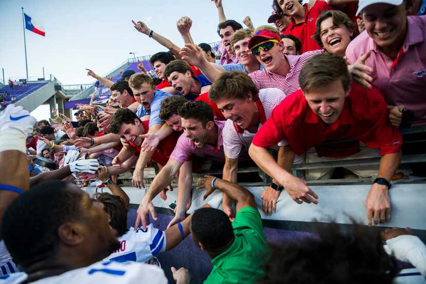 Southern Methodist Mustangs fans celebrate a 41-38 win over TCU Horned Frogs on Saturday,...