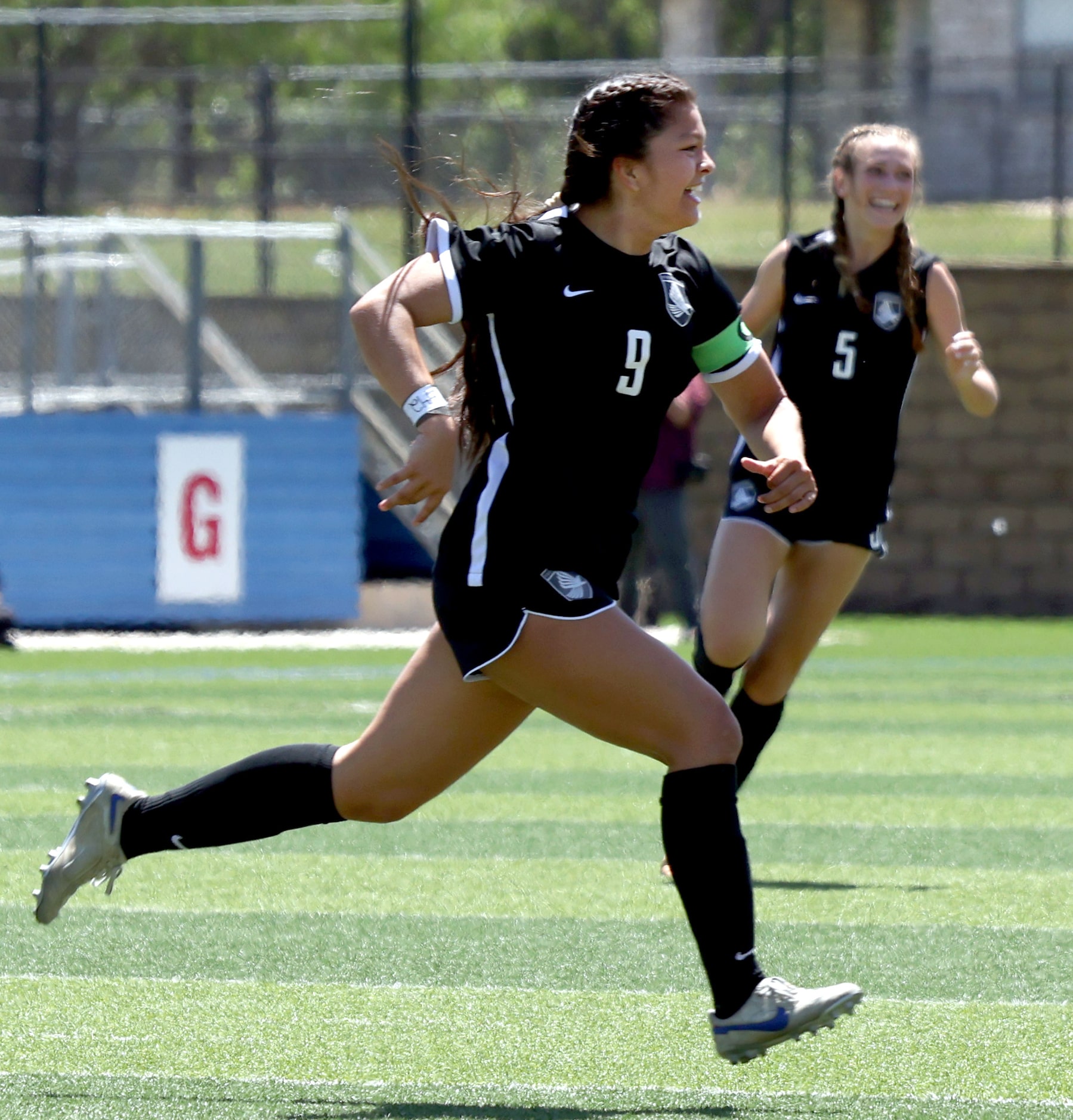  Prosper forward Brooklyn Miller (9) bolts enthusiastically toward the team bench after...