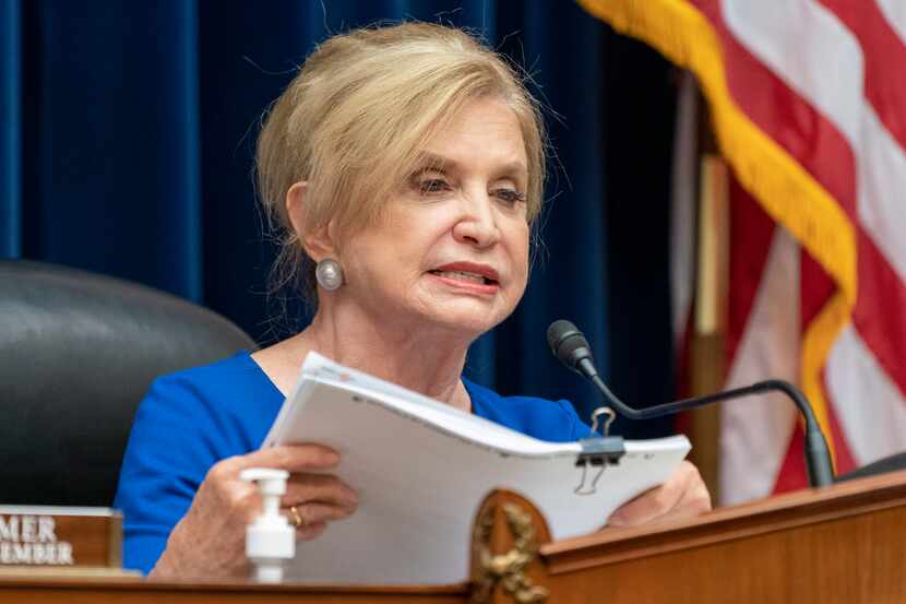 Hous​e Oversight Committee Chair Rep. Carolyn Maloney, D-N.Y., held up documents during a...