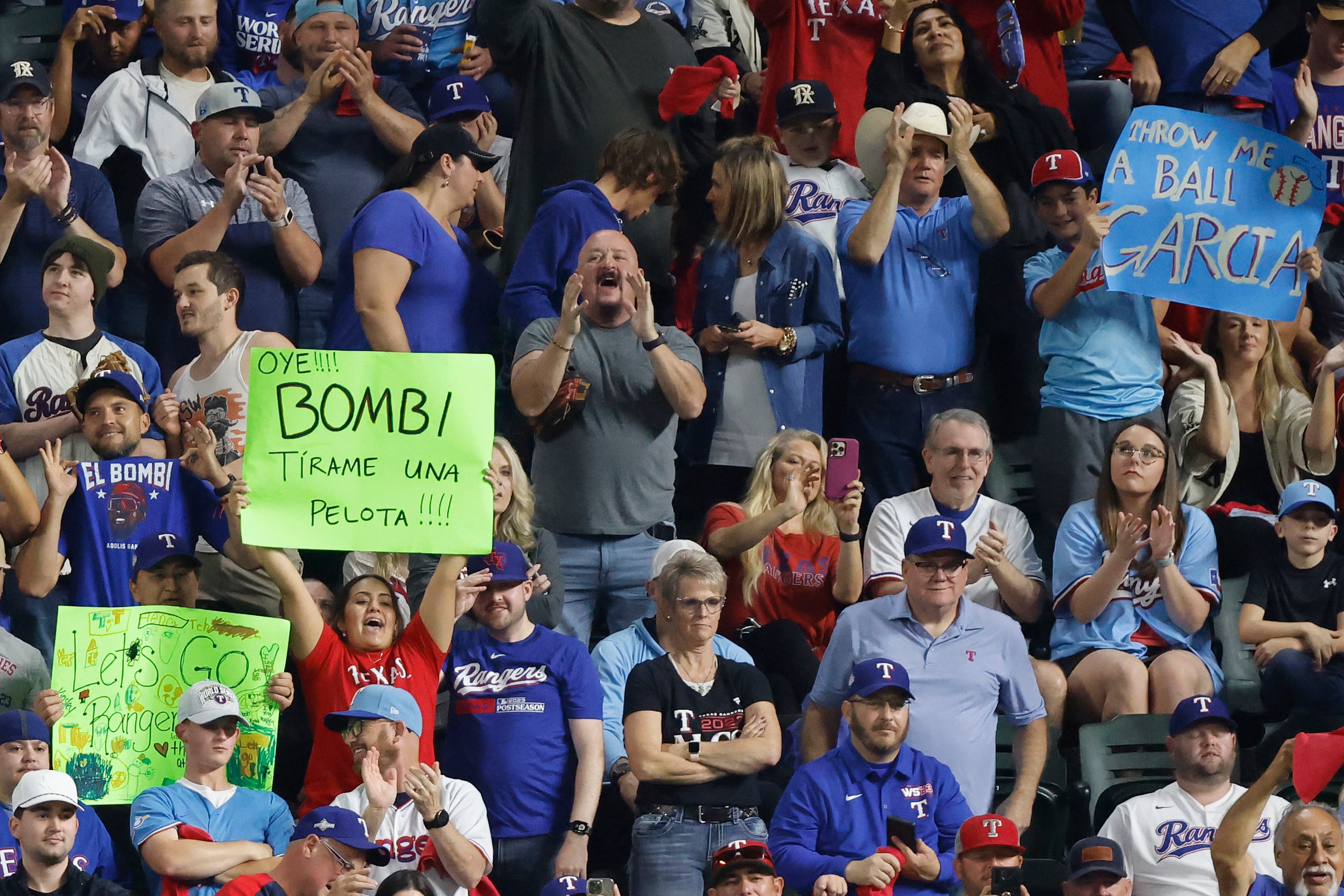 Texas Rangers fans cheer during the first inning in Game 2 of the World Series against the...