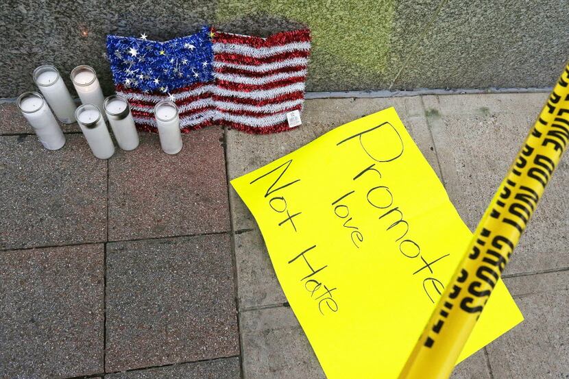 A small memorial was set up Friday morning at the Greyhound station about a block from the...