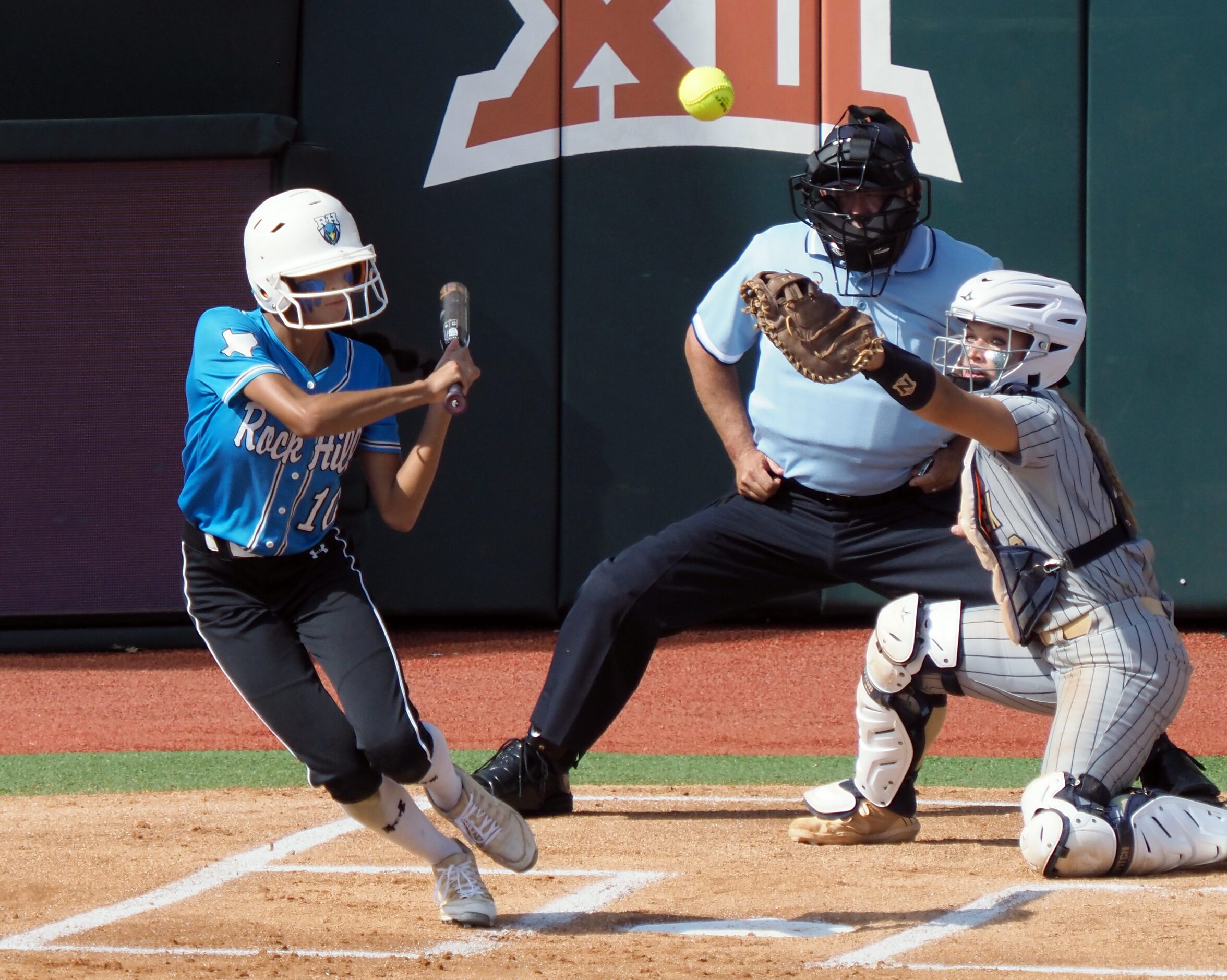 Prosper Rock Hill batter Veronica Cully hits the ball against Montgomery Lake Creek in the...