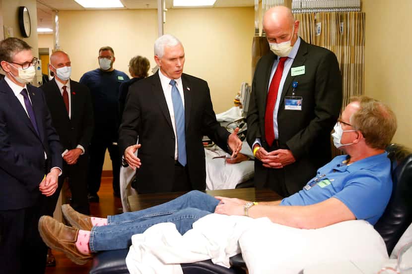 Vice President Mike Pence visits with a patient at the Mayo Clinic in Rochester, Minn. , on...