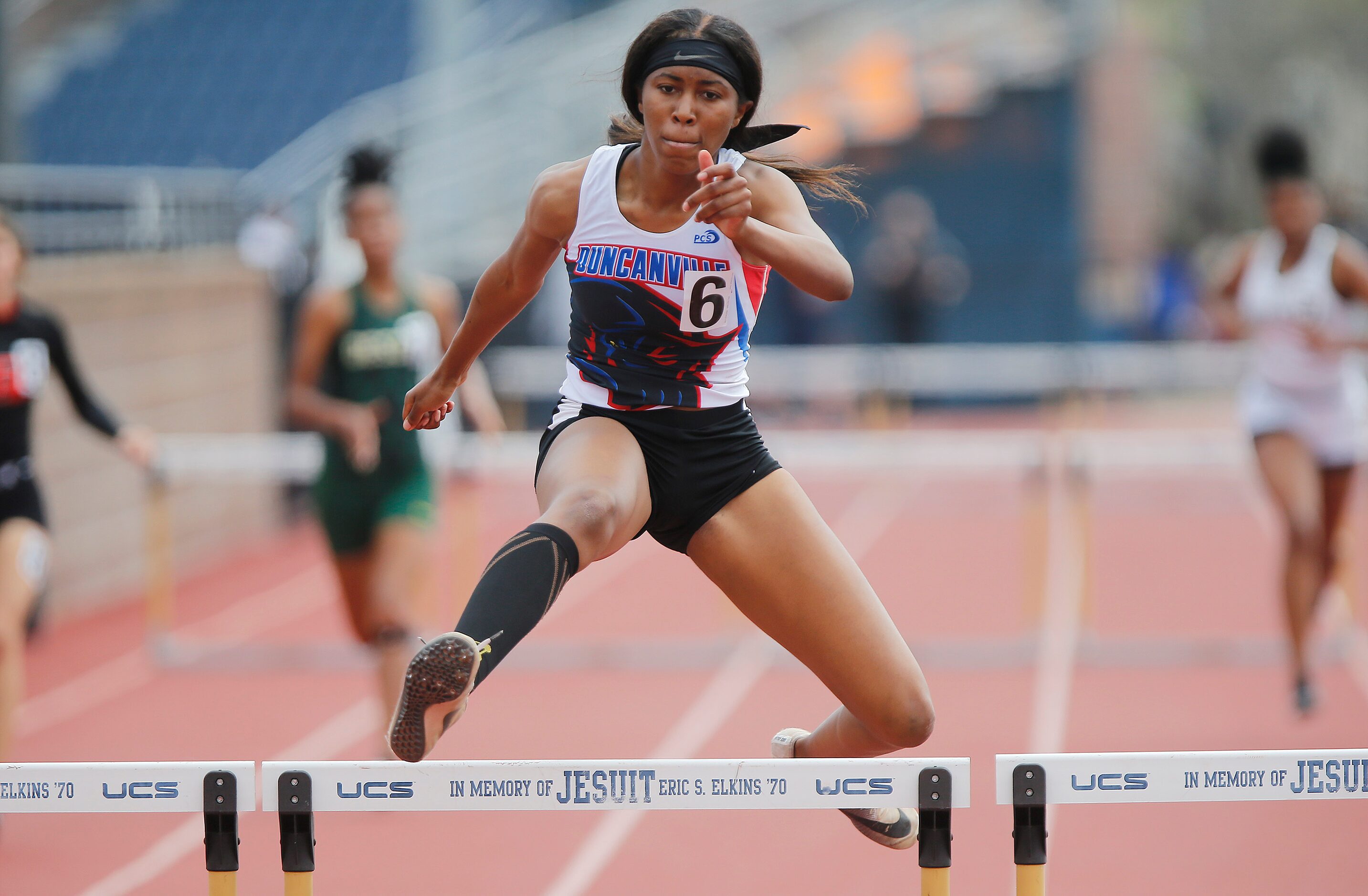 Loreal Jones, 16, of Duncanville High School, finished first in the second heat of the girls...