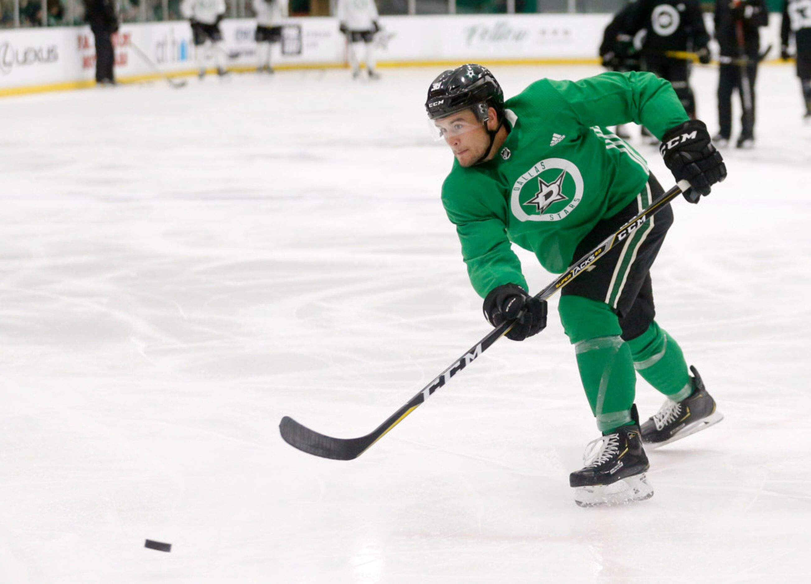 Dallas Stars Joel L'Esperance (38) takes a shot on goal during Dallas Stars training camp at...