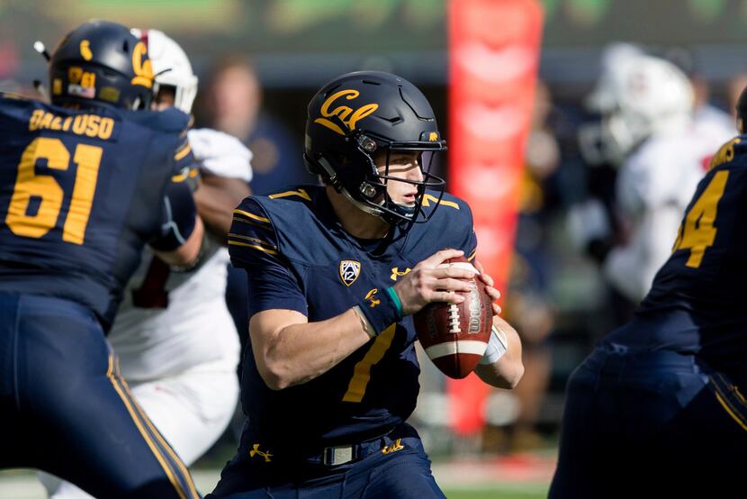 California quarterback Chase Garbers looks to pass against the Stanford in the first quarter...