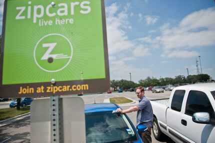  Chaz Lilly demonstrates how to rent a zip car from the UT Dallas campus, Saturday, April...