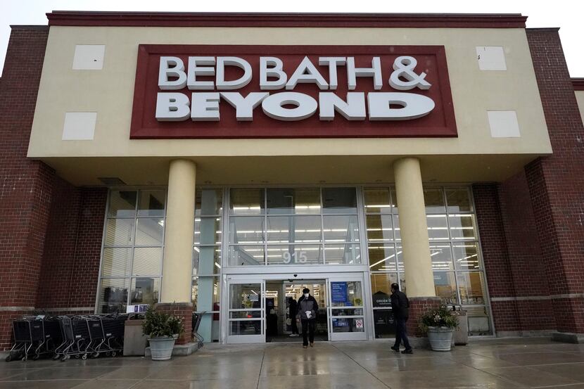 Shoppers enter and exit a Bed Bath & Beyond in Schaumburg, Ill., in 2021. Struggling Bed...