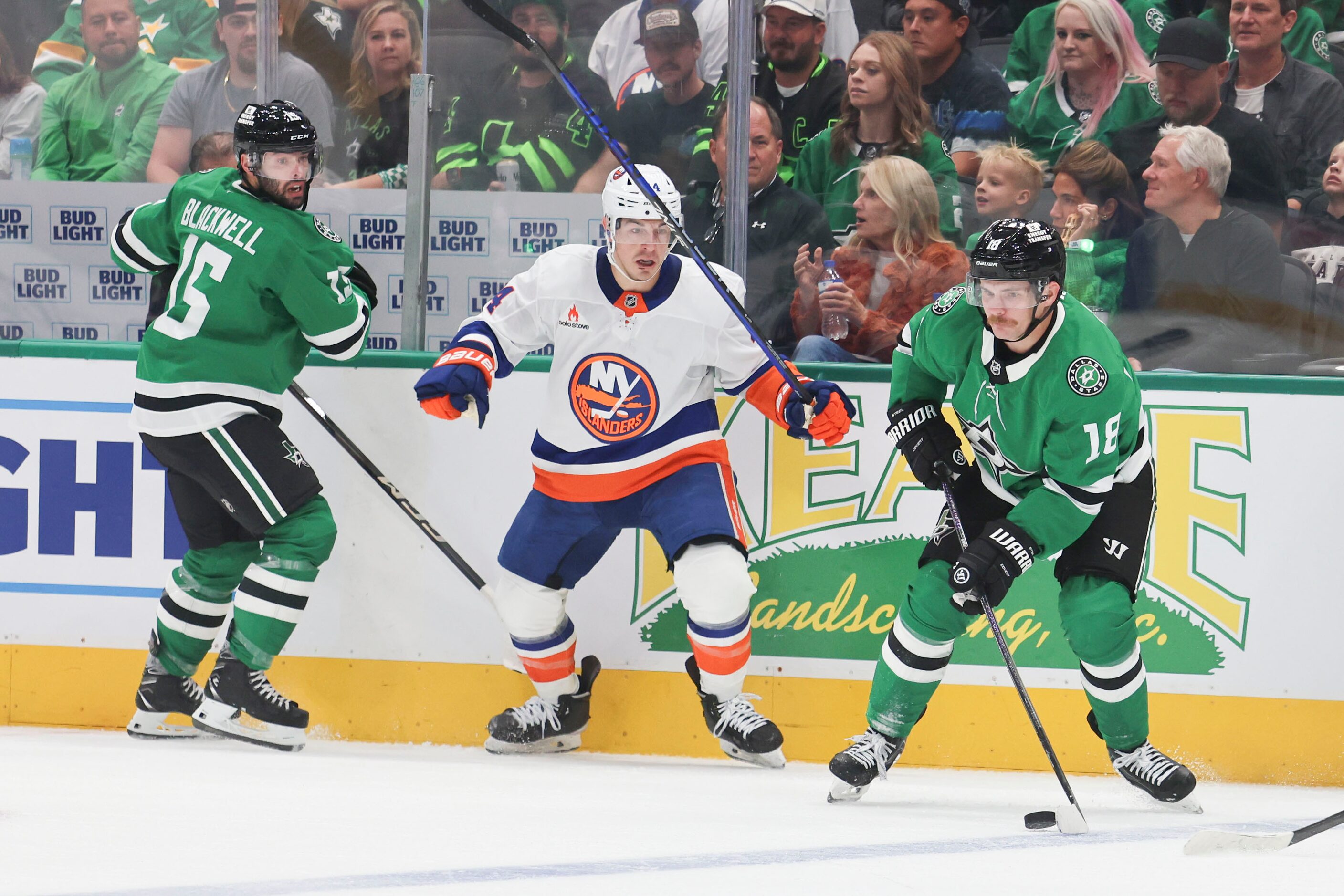 New York Islanders center Jean-Gabriel Pageau (center) follows as Dallas Stars center Sam...