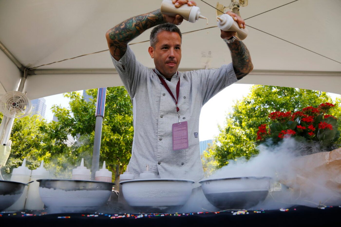 Philip Speer makes dip n dots ice cream to go with home made cookies from Becky Masson at...