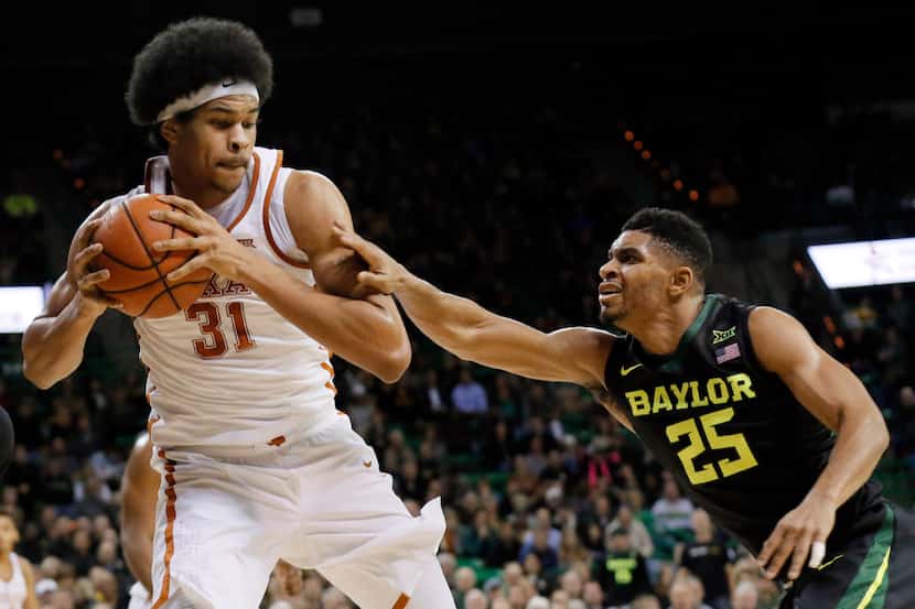 Texas forward Jarrett Allen (31) comes down with an offensive rebound in front of Baylor's...